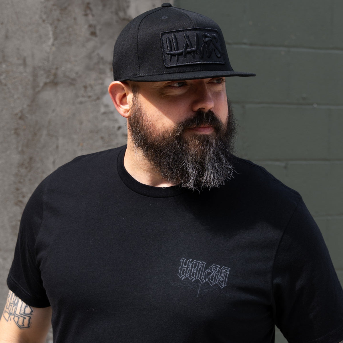 Revolt Flexfit Flat Bill - Blackout Crew