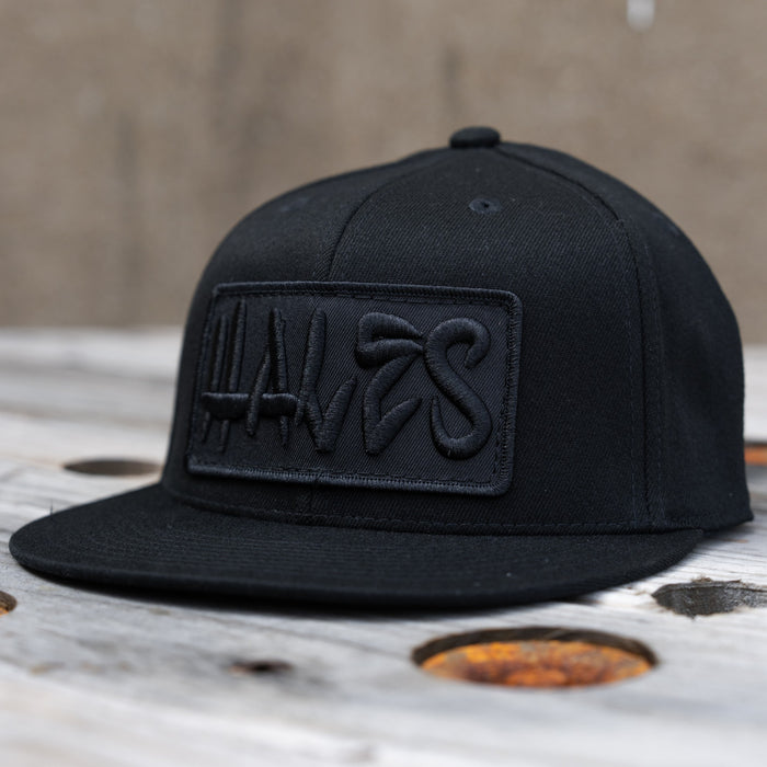 Revolt Flexfit Flat Bill - Blackout Crew